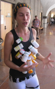 Tippens wearing bottles of pills 